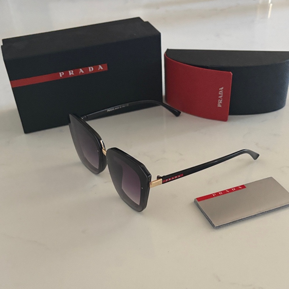 Prada Black and Gold Sunglasses